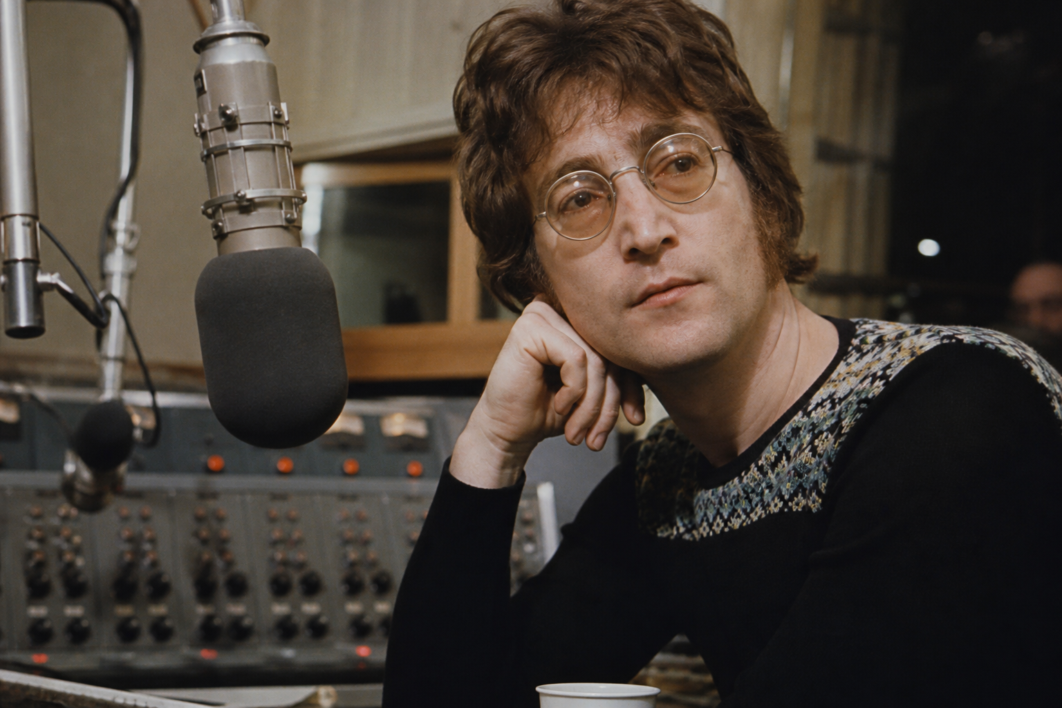 John Lennon at a recording studio in 1970, editorial style