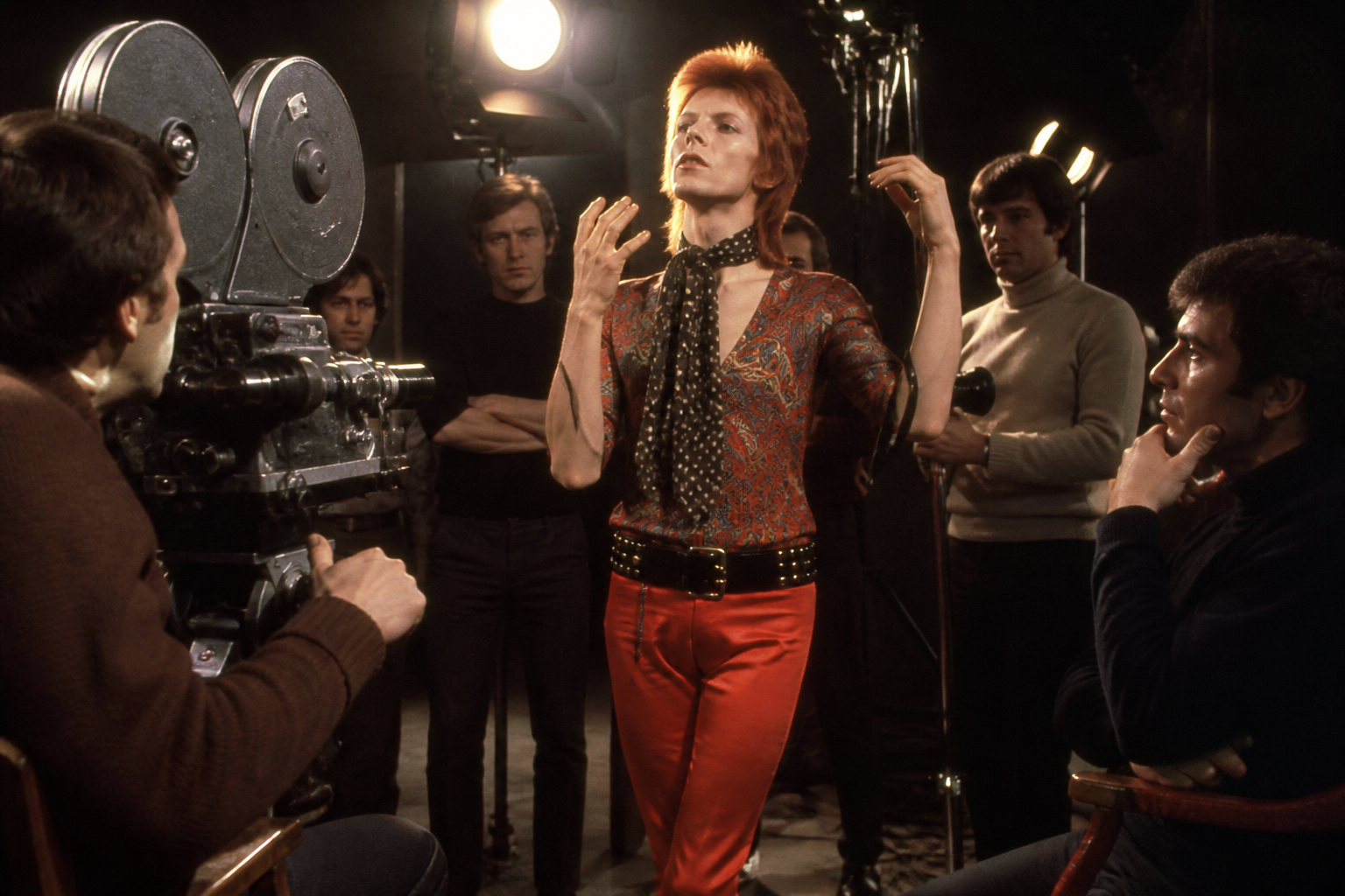 David Bowie-era 1967 promotional film set with a young performer under studio lights