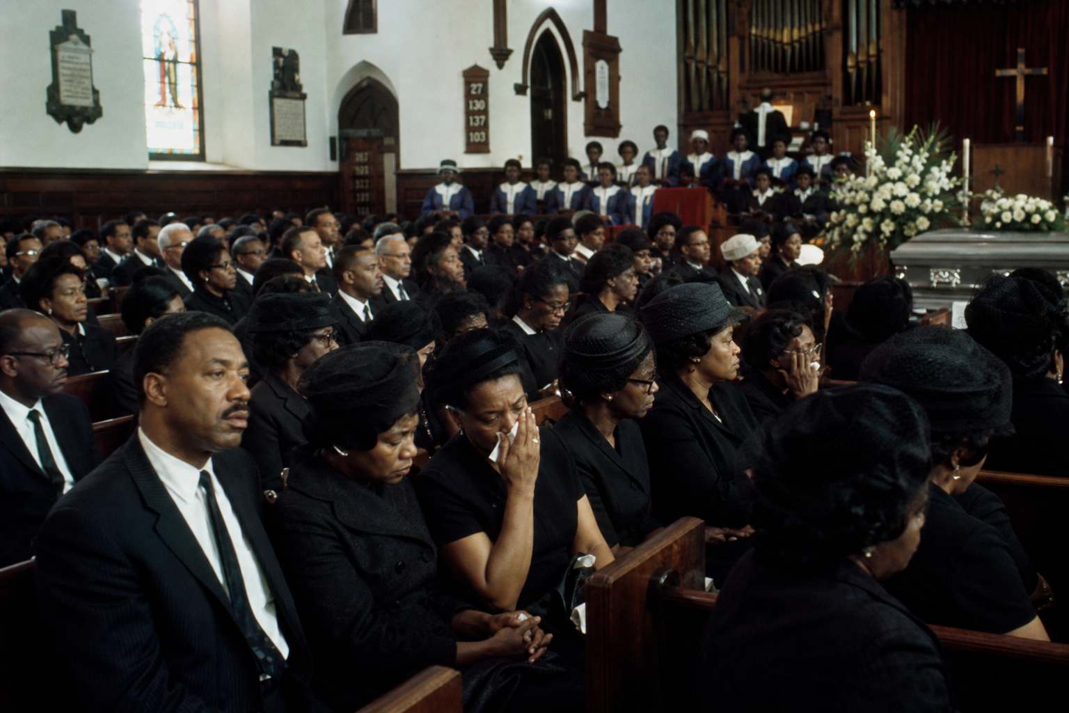 Historic church congregation during a funeral-week gospel performance