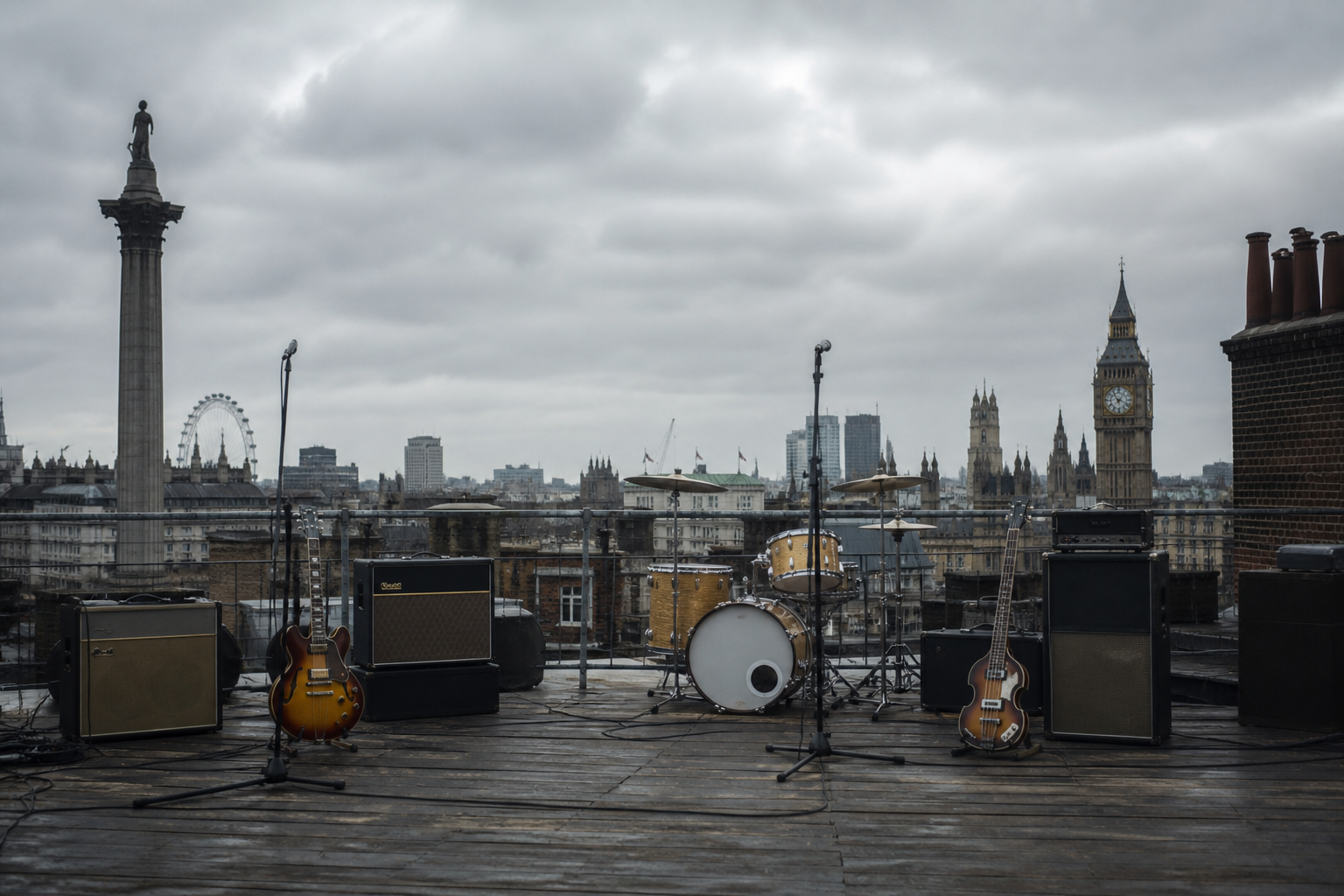 empty rooftop stage with instruments under a grey London sky