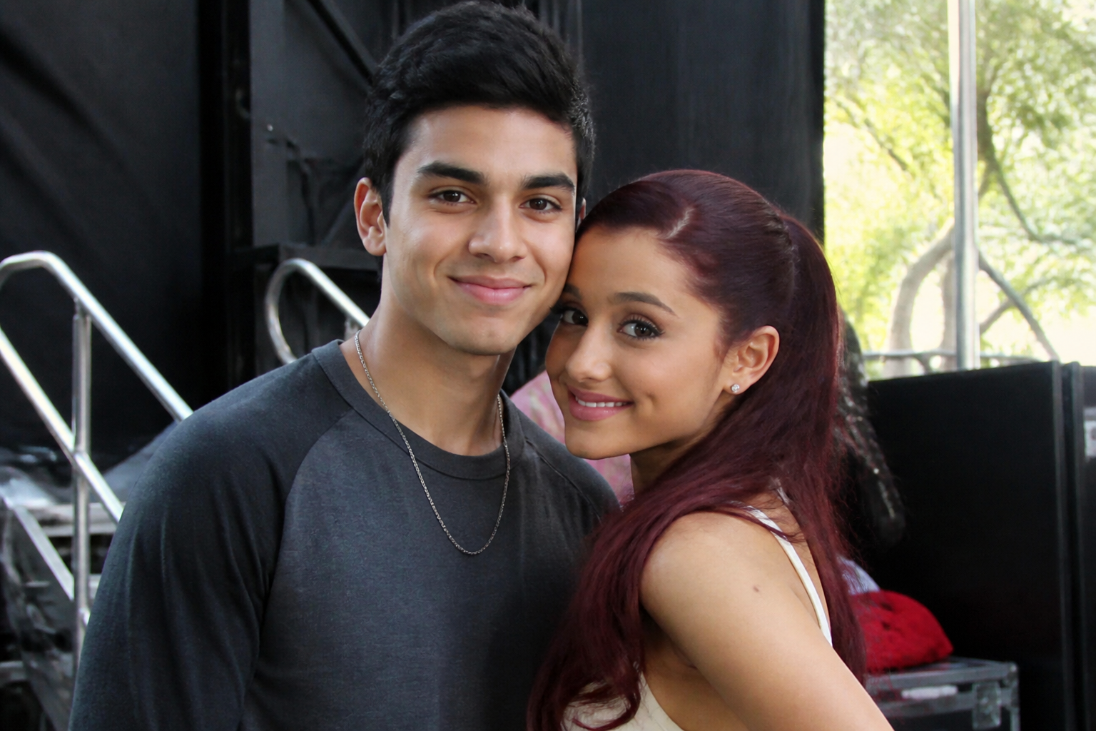 Ariana Grande at a public appearance with Ricky Alvarez