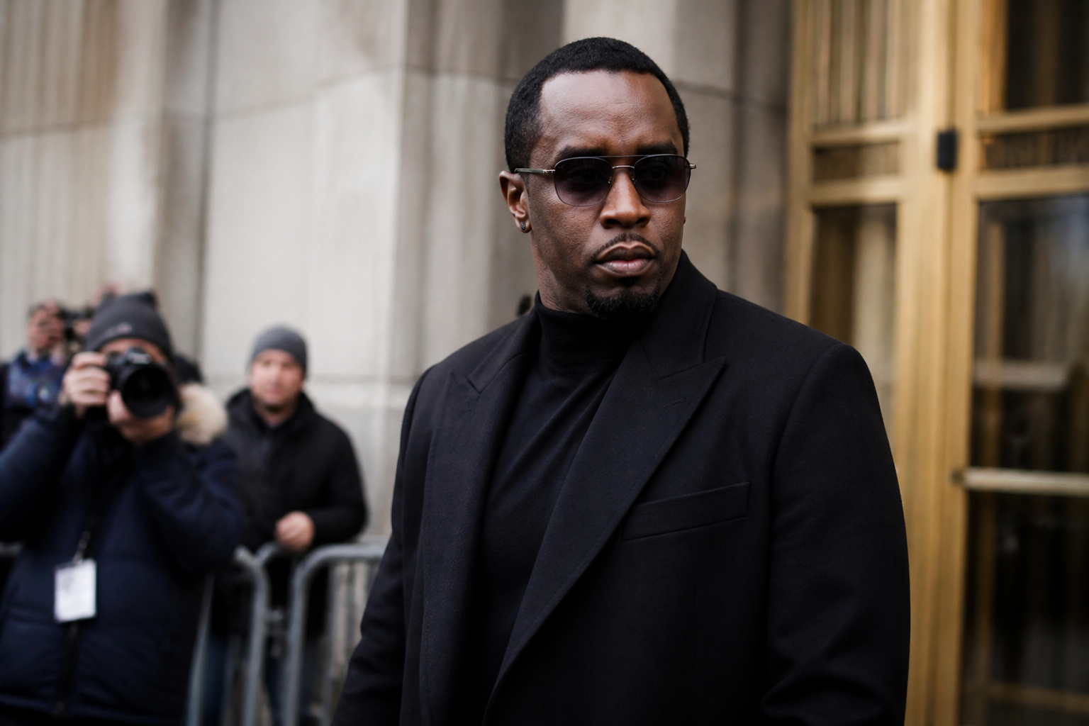 Sean Combs outside a courthouse